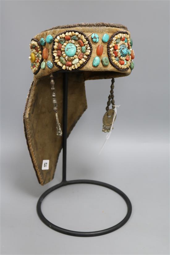 A Tibetan headpiece on stand